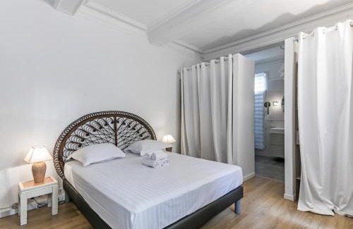 Ecusson Apartamento | Villa jeu de paume - Première conciergerie