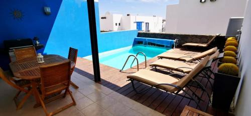 Playa Blanca Villa | Villa Mariña piscina climatizada opcional y 2 bicis gratuitas