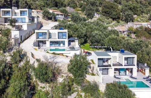 Petaleia Villa | Villa Nissaki View 1 by Villa Plus