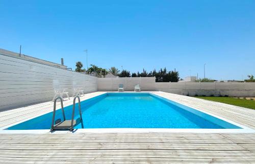 Torre Lapillo Villa | Villa Pace by BarbarHouse