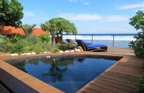 Grand Fond Villa | Villa Coral Perla con 'pies en el agua' de la piscina-spa de acceso directo a la laguna