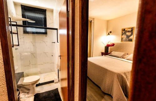 Itapua Apartamento | Villa Romana - Experiência única em frente à Praia de Itapuã, apartamento todo climatizado