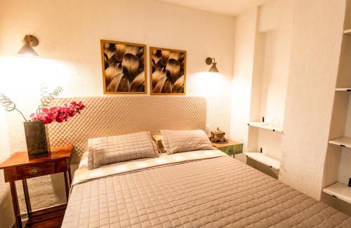 Itapua Apartamento | Villa Romana - Experiência única em frente à Praia de Itapuã, apartamento todo climatizado