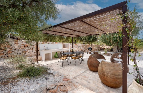 Castellana Grotte Casa | Villa 'Trulli Di Titti Countryhouse' con jardín privado, Wi-Fi y aire acondicionado
