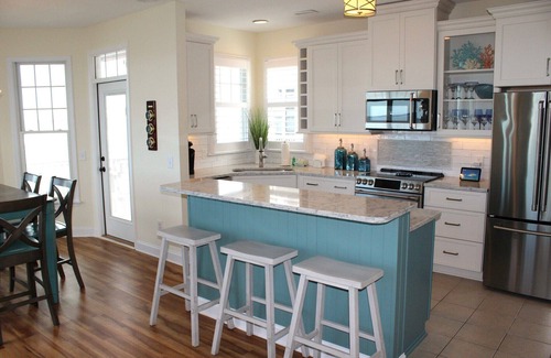 Manteo Casa | Village Landings 66, hermosa casa de 4 dormitorios con frente de sonido en Pirate's Cove