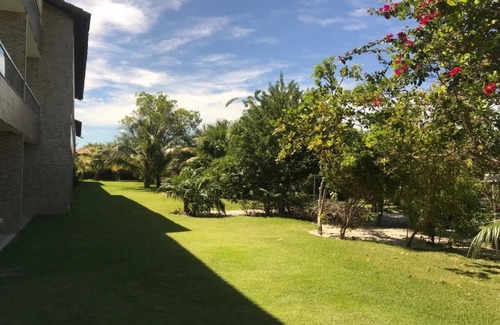 Itacimirim Apartamento | VILLAGE WITH FOUR SUITES, NEAR THE BEACH, VERY GREEN AND TRANQUILITY