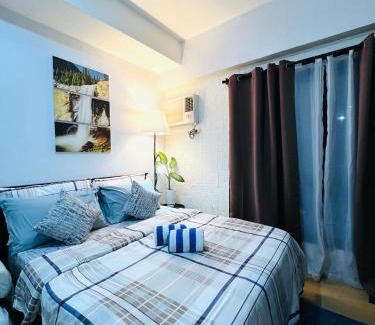 Phil-Am Apartamento | Vinia Infinity Studio 2 Near Malls with WiFi Netflix and Karaoke