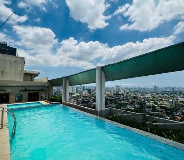 Phil-Am Apartamento | Vinia Infinity Studio 2 Near Malls with WiFi Netflix and Karaoke