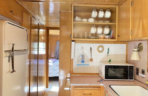 Kernville Casa | Vintage wood paneled travel trailer on Kernville Ranch with horses and hot tub