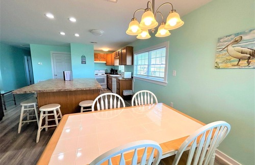 Grand Isle Apartamento | Vitamin Sea está frente a la playa con acceso a la playa en Grand Isle