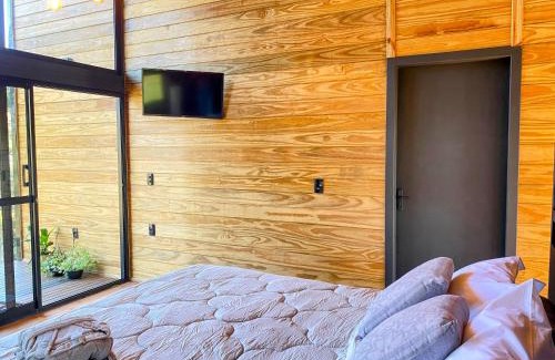 Rio Rufino Casa | Vivenda das Araucárias 02 Microcasa Aconchegante lareira, banheira