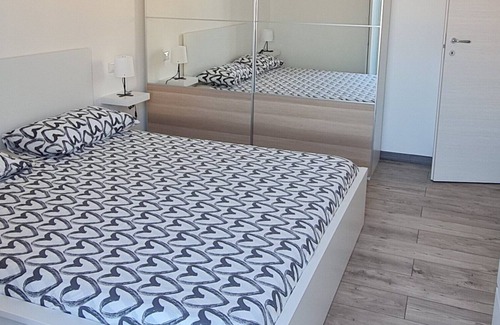 Oristano Apartamento | Vrbo Property
