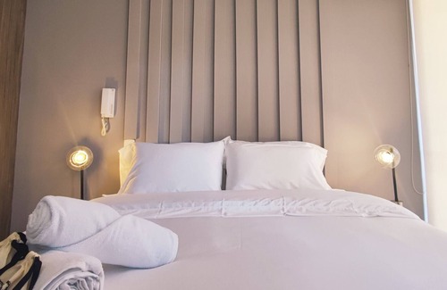 Centro International Apartamento | w*| Sophisticated 1BR in Luxury Building