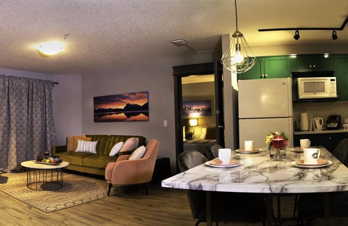 Cougar Creek Apartamento | W216- heated parkade, BBQ, AC, FreeParking, Gym