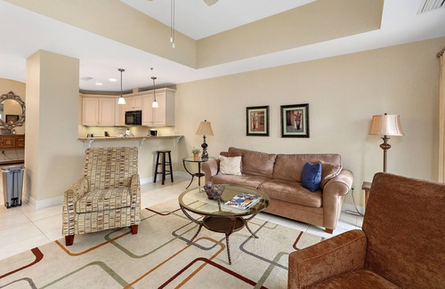 Demere Park Condominio | Walk or Bike to Pier and Village from Salt Air Villas! Community Pool and Private Balcony