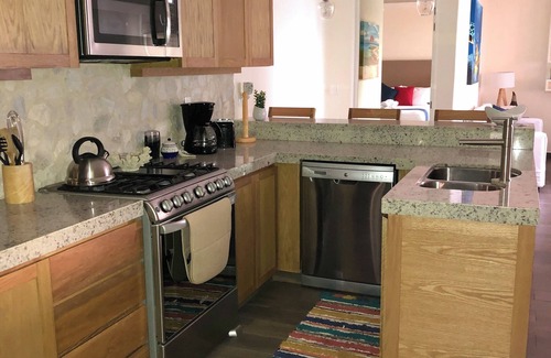 Bajos de Chila Condominio | Walk out to pool and ocean steps away.