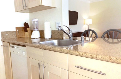 Indio Condominio | A poca distancia de Coachella! Al lado de Indian Palms Country Club
