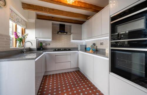 Tenby Apartamento | Wall Cottage