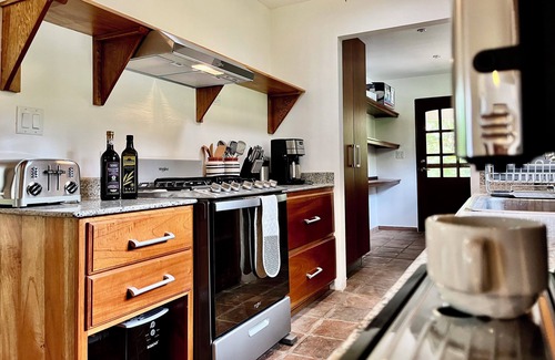Hato Viejo Casa | Wanakaset 2 bedrooms riverfront house w/ Private Garden & Shared Pool, 4 pax