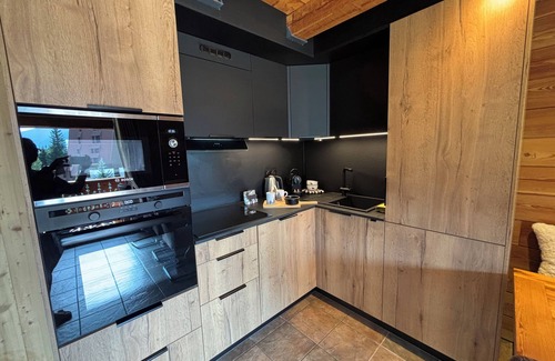 La Salle-les-Alpes Apartamento | Aplicación estilo chalet con carácter, cálida y cómoda al pie de las pistas.