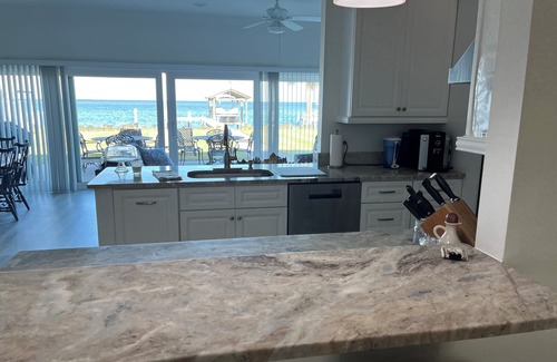 Ruskin Casa | Observe puestas de sol y peces desde su propia casa privada y atraque en Tampa Bay