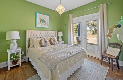 Panama City Casa | Watch the boats passing through Massalina Bayou from the front porch.