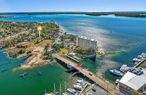Panama City Casa | Watch the boats passing through Massalina Bayou from the front porch.