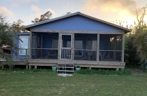 Cedar Island Casa | Watch the sun rise from this waterfront home.
