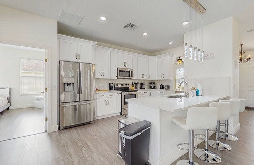 Trafalgar Village Casa | Water view retreat with lanai, heated pool, pool spa, game room, & AC
