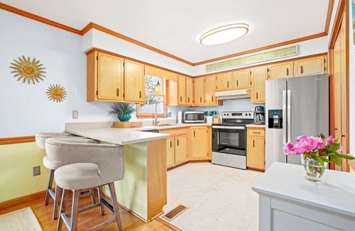 West Ocean City Casa | Waterfront Coastal Casual Home with Screened Deck + Boat Dock + Dog-Friendly!
