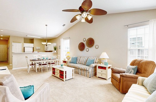 Sunset Beach Condominio | Waterfront condo with pool, tennis, bikes & lagoon/golf views - near the beach