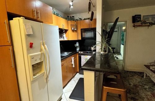 North Miami Condominio | Waterfront Condo with Fishing, Paddleboard, and yard access.