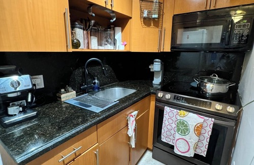 North Miami Condominio | Waterfront Condo with Fishing, Paddleboard, and yard access.