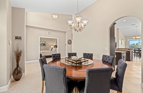 Burnt Store Casa | Waterfront dog-friendly house with pool, dock, pool spa, patio & sunrise views