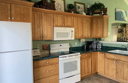 Fenwick Island Casa | Waterfront Beach House in Fenwick, 3 Decks, Linens, Dock, Bikes, Kayaks, SUPs
