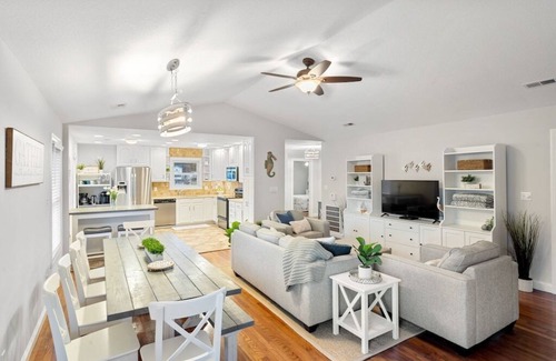 Colington Harbour Casa | Waterfront! Game Room, Hot Tub, Kayaks, SUPSs, Fire Pit, Theater Room, Dogs OK