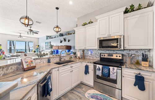 Tropic Casa | Waterfront Game Room Theater Sleeps 14 Luxurious Waterfront Retreat