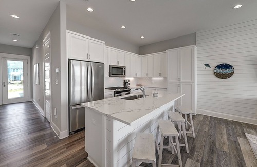 Rockport Casa | Waterfront haven with Bay views, patio, luxe suites, and shared dock and pool