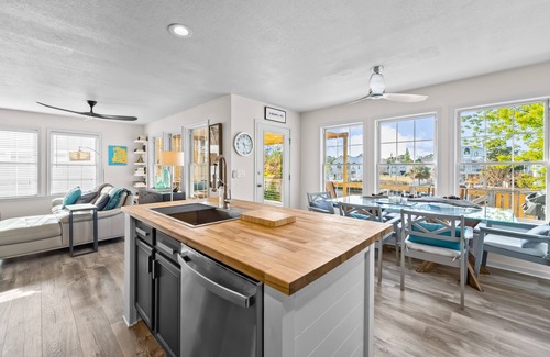 Colington Harbour Casa | Waterfront home and Oasis with private dock, outdoor bar and firepit