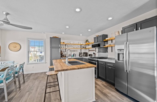 Colington Harbour Casa | Waterfront home and Oasis with private dock, outdoor bar and firepit