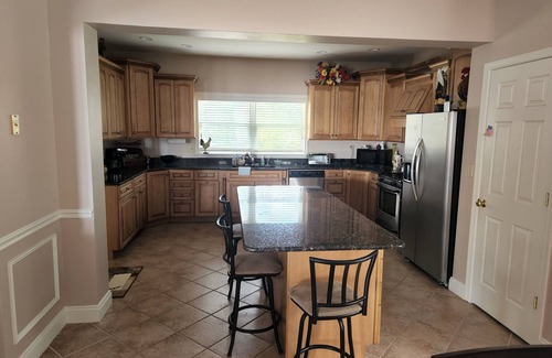 Rehoboth Beach Casa | Waterfront home with dock, gazebo, and fenced yard