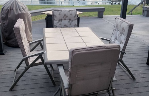 Rehoboth Beach Casa | Waterfront home with dock, gazebo, and fenced yard
