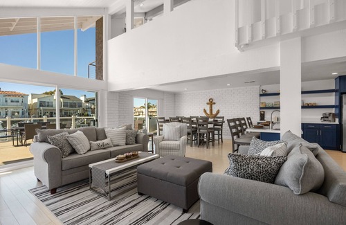 Channel Islands Casa | Waterfront home with kayaks, grill, Pac-Man, AC, balconies, & smart TVs