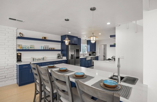 Channel Islands Casa | Waterfront home with kayaks, grill, Pac-Man, AC, balconies, & smart TVs