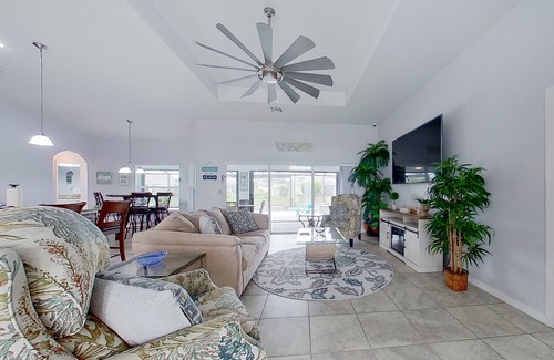 Trafalgar Casa | Waterfront home with private pool, dock, WiFi, central AC, and desk workspaces