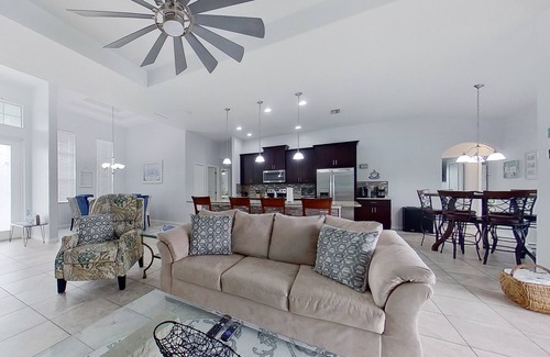 Trafalgar Casa | Waterfront home with private pool, dock, WiFi, central AC, and desk workspaces