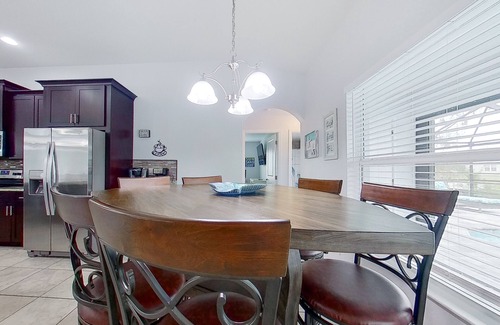 Trafalgar Casa | Waterfront home with private pool, dock, WiFi, central AC, and desk workspaces