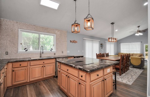 Montgomery Casa | Waterfront house with a large deck and dock for boat or fishing