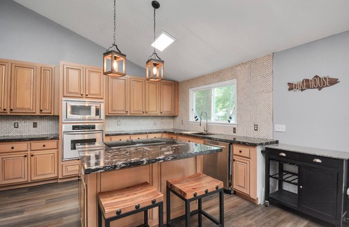 Montgomery Casa | Waterfront house with a large deck and dock for boat or fishing
