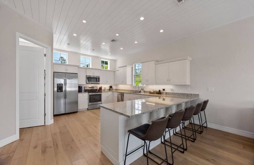 South Island Casa | Waterfront Luxury | Walk to Beach | Heated Pool